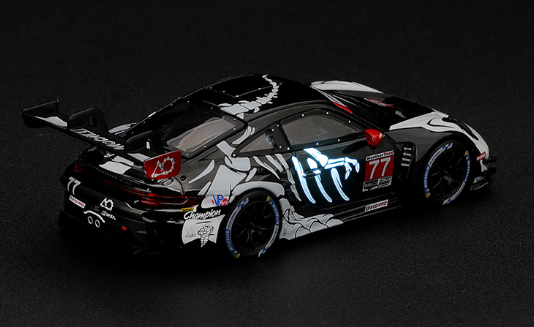 (Preorder) Mini GT 1:64 Porsche 911 GT3 R (992) #77 AO Racing “Skeleton Rexy” 2026 IMSA Petit Le Mans – (Glow in the Dark) – Limited Edition